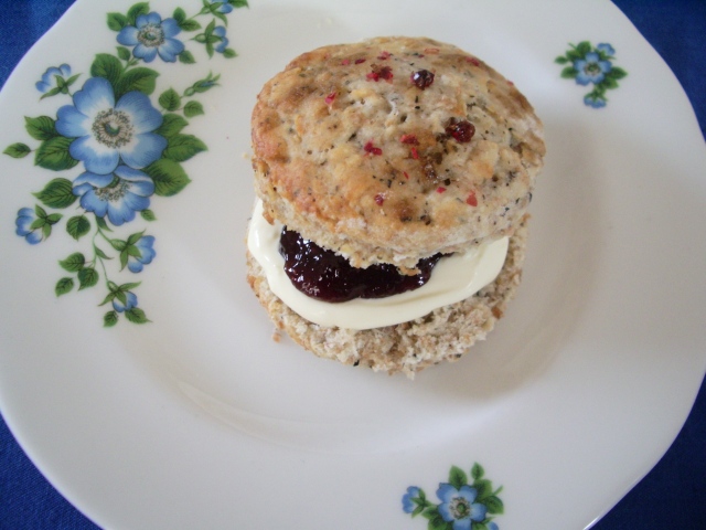 Darjeeling and pink peppercorn scone, served with strawberry jam and clotted cream